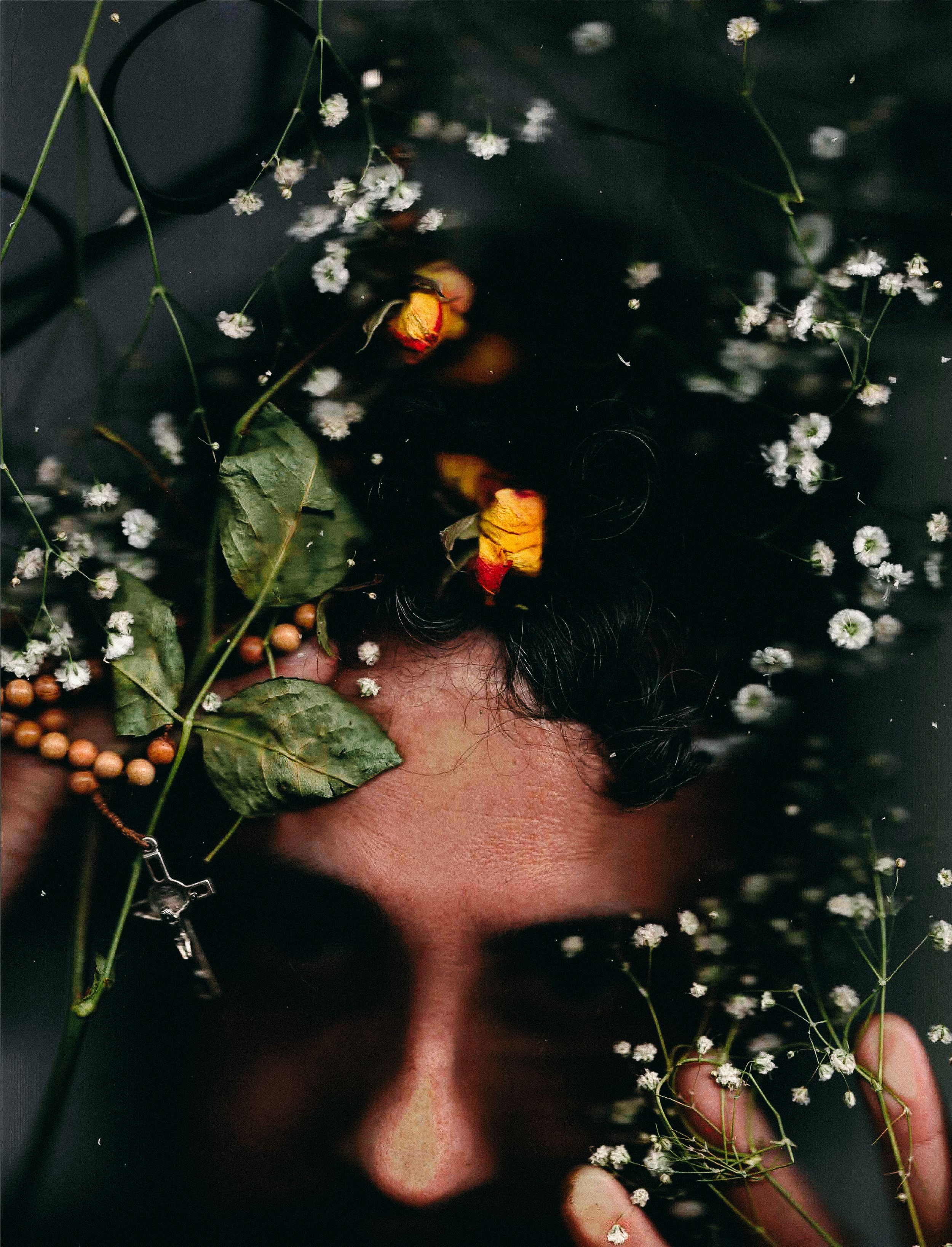 Self-portrait of Dario Hudon with flowers and butterflies in surreal composition | Le Café Studio